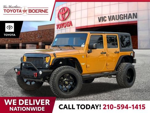 Used 2014 Jeep Wrangler Unlimited Sahara w/ Dual Top Group image 1