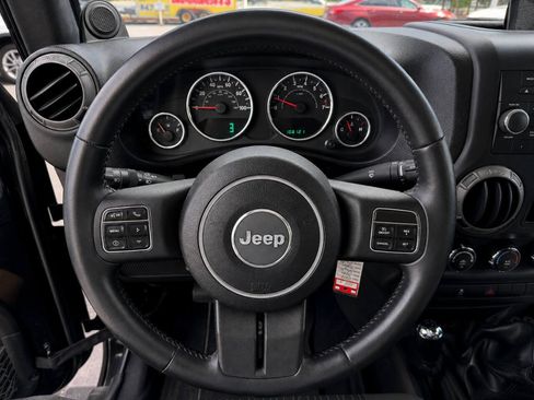 Used 2012 Jeep Wrangler Unlimited Sport w/ Connectivity Group AWD/4WD image 8