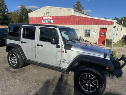 Used 2011 Jeep Wrangler Unlimited Sport w/ Black Appearance Group