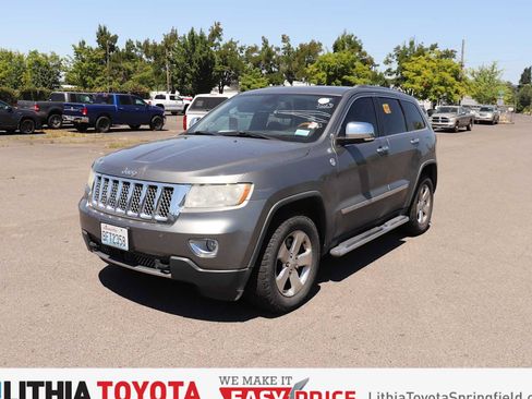 Used 2013 Jeep Grand Cherokee Overland w/ Advance Technology Group AWD/4WD image 1