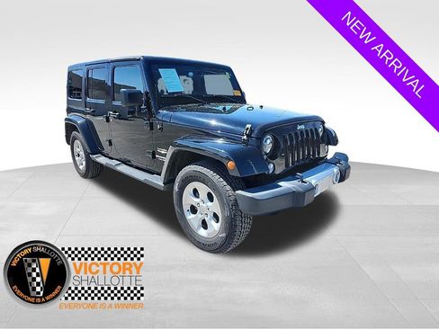 Used 2015 Jeep Wrangler Unlimited Sahara w/ Dual Top Group image 1