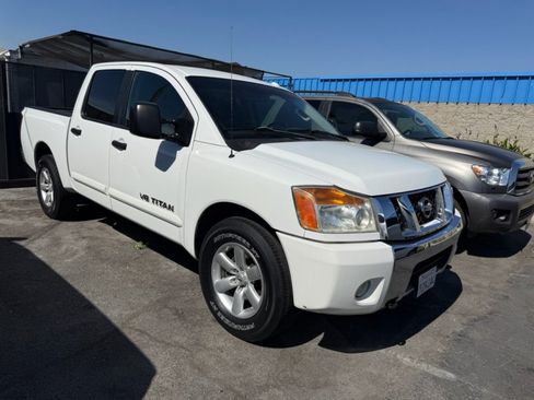 Used 2012 Nissan Titan SV w/ SV Premium Utility Pkg RWD image 1