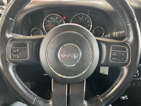 Used 2012 Jeep Wrangler Unlimited Sahara w/ Dual Top Group AWD/4WD image 12