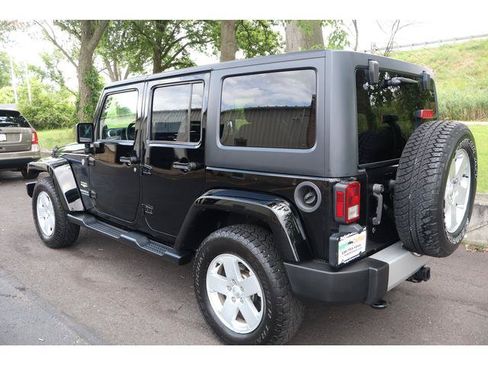 Used 2012 Jeep Wrangler Unlimited Sahara w/ Dual Top Group AWD/4WD image 4
