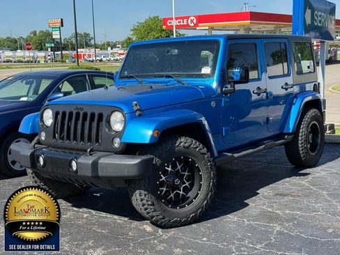 Used 2014 Jeep Wrangler Unlimited Sahara AWD/4WD image 2