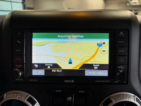 Used 2014 Jeep Wrangler Unlimited Sahara w/ Dual Top Group AWD/4WD image 13