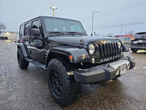 Used 2014 Jeep Wrangler Unlimited Sahara w/ Dual Top Group image 1