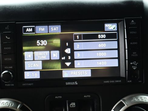 Used 2016 Jeep Wrangler Unlimited Sahara w/ Dual Top Group AWD/4WD image 35