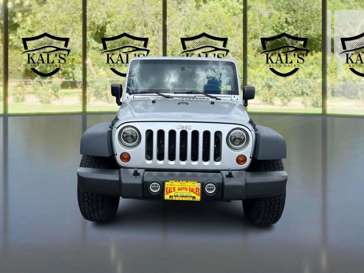 Used 2012 Jeep Wrangler Unlimited Sport AWD/4WD image 2