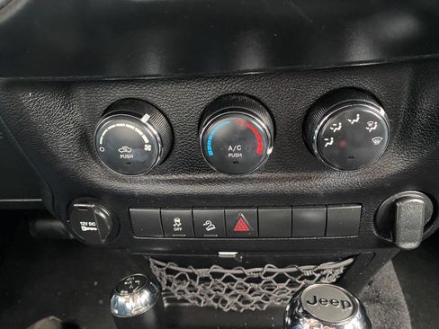 Used 2013 Jeep Wrangler Unlimited Sport w/ Mopar Black Appearance Group image 23