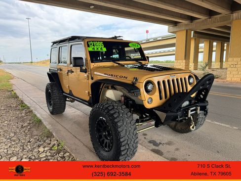 Used 2014 Jeep Wrangler Unlimited Rubicon w/ Max Tow Package AWD/4WD image 1
