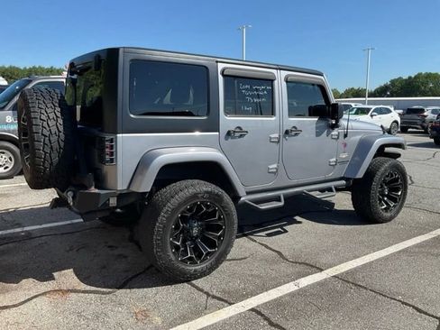 Used 2014 Jeep Wrangler Unlimited Sahara w/ Dual Top Group AWD/4WD image 7