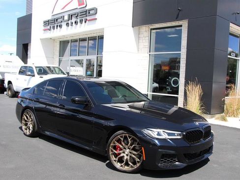 Used 2021 BMW M550i xDrive AWD/4WD image 1