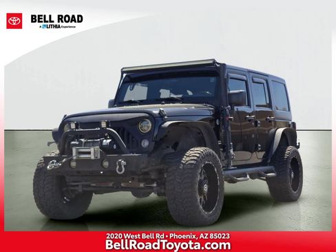 Used 2015 Jeep Wrangler Unlimited Sahara w/ Dual Top Group AWD/4WD image 1