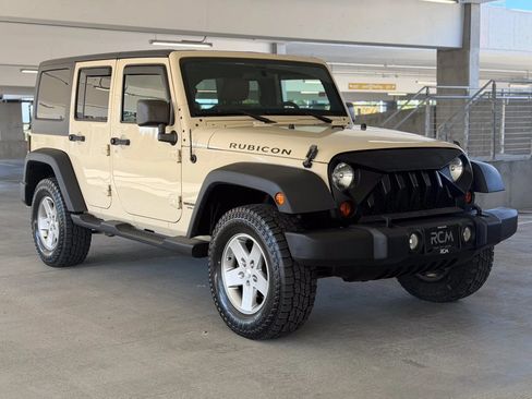 Used 2011 Jeep Wrangler Unlimited Rubicon w/ Dual Top Group AWD/4WD image 3