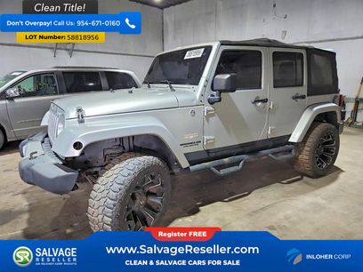 Used 2012 Jeep Wrangler Unlimited Sahara w/ Dual Top Group