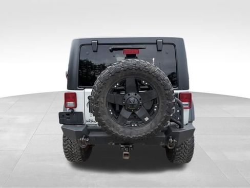 Used 2012 Jeep Wrangler Unlimited Rubicon w/ Dual Top Group AWD/4WD image 4