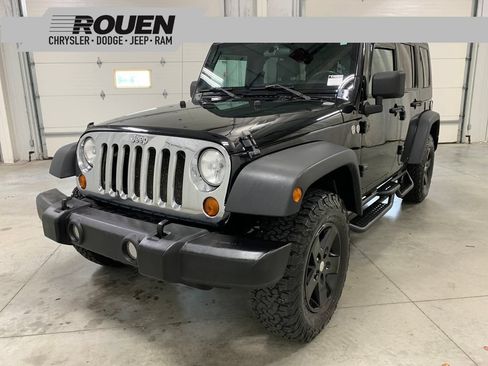 Used 2010 Jeep Wrangler Unlimited Sport AWD/4WD image 1