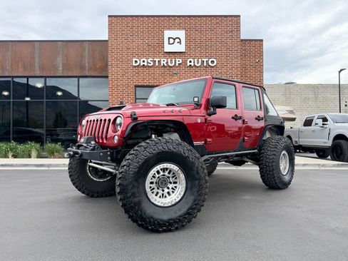 Used 2013 Jeep Wrangler Unlimited Rubicon w/ Dual Top Group AWD/4WD image 1