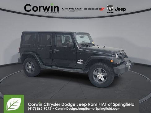 Used 2011 Jeep Wrangler Unlimited Sport w/ Connectivity Group AWD/4WD image 1