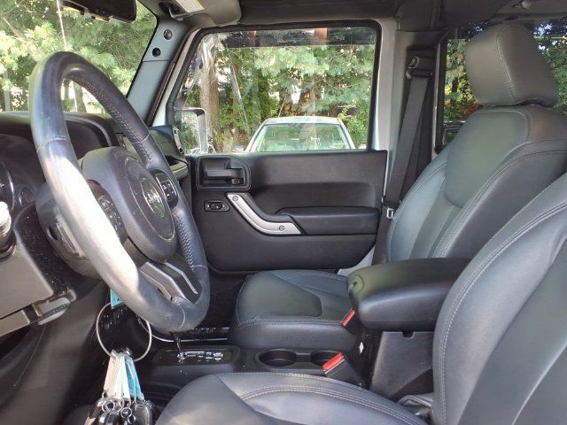 Used 2013 Jeep Wrangler Unlimited Sahara w/ Dual Top Group AWD/4WD image 16