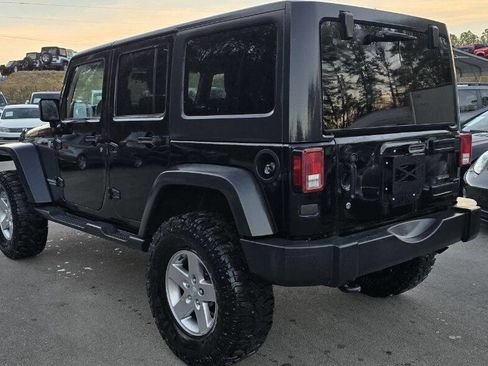 Used 2012 Jeep Wrangler Unlimited Rubicon w/ Dual Top Group image 8