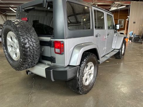 Used 2013 Jeep Wrangler Unlimited Sahara w/ Trailer Tow Group AWD/4WD image 4