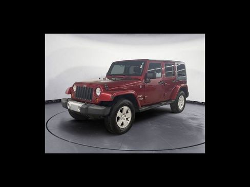Used 2012 Jeep Wrangler Unlimited Sahara w/ Dual Top Group AWD/4WD image 2