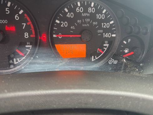 Used 2013 Nissan Frontier SV image 1