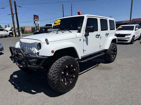 Used 2012 Jeep Wrangler Unlimited Sahara w/ Connectivity Group AWD/4WD image 3