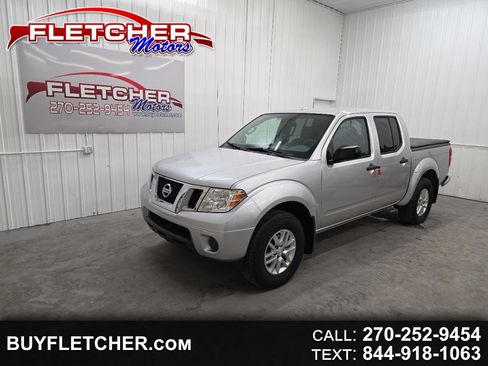 Used 2014 Nissan Frontier SV image 1
