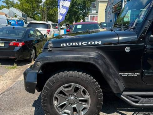 Used 2016 Jeep Wrangler Unlimited Rubicon w/ Dual Top Group AWD/4WD image 14