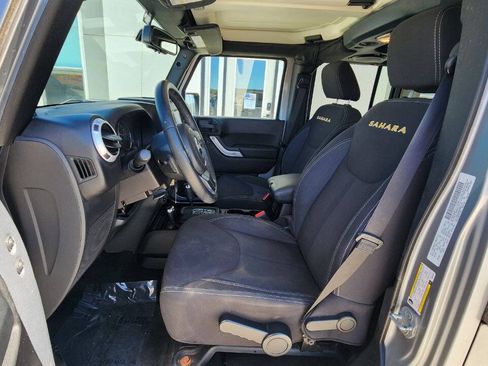 Used 2013 Jeep Wrangler Unlimited Sahara w/ Dual Top Group AWD/4WD image 10