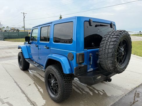 Used 2014 Jeep Wrangler Unlimited Sahara w/ Dual Top Group image 14