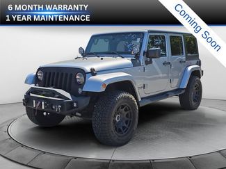 Used 2015 Jeep Wrangler Unlimited Sahara w/ Dual Top Group AWD/4WD video 1