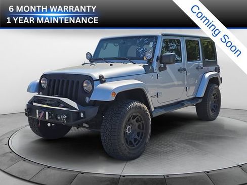 Used 2015 Jeep Wrangler Unlimited Sahara w/ Dual Top Group AWD/4WD image 1