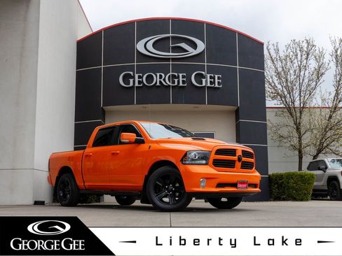 Used 2017 RAM 1500 Sport w/ Ignition Orange Sport Package AWD/4WD image 1