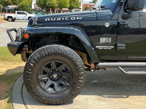 Used 2012 Jeep Wrangler Unlimited Rubicon w/ Dual Top Group AWD/4WD image 12