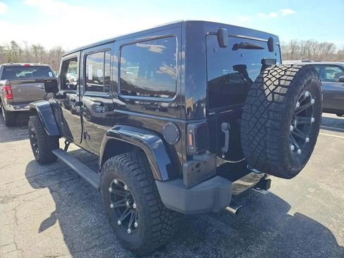 Used 2014 Jeep Wrangler Unlimited Sahara w/ Dual Top Group AWD/4WD image 2