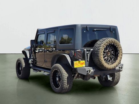 Used 2015 Jeep Wrangler Unlimited Sahara w/ Dual Top Group AWD/4WD image 4