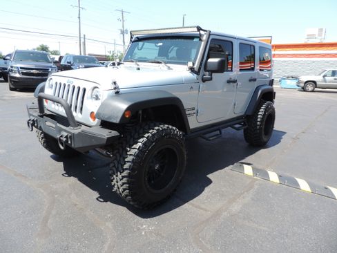 Used 2012 Jeep Wrangler Unlimited Sport w/ PWR Convenience Group AWD/4WD image 1
