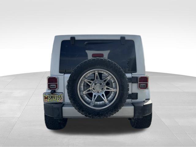 Used 2012 Jeep Wrangler Unlimited Sahara w/ Connectivity Group AWD/4WD image 4