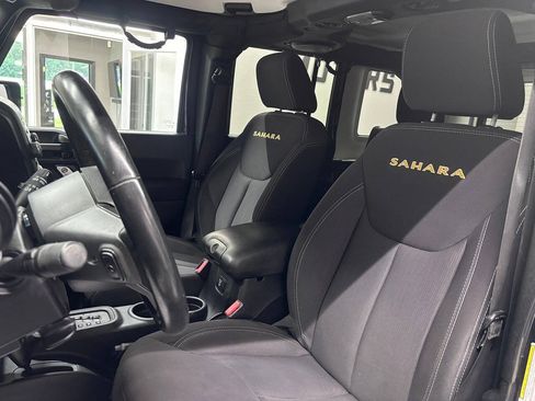 Used 2013 Jeep Wrangler Unlimited Sahara w/ Dual Top Group AWD/4WD image 14