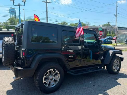 Used 2016 Jeep Wrangler Unlimited Rubicon w/ Dual Top Group AWD/4WD image 4