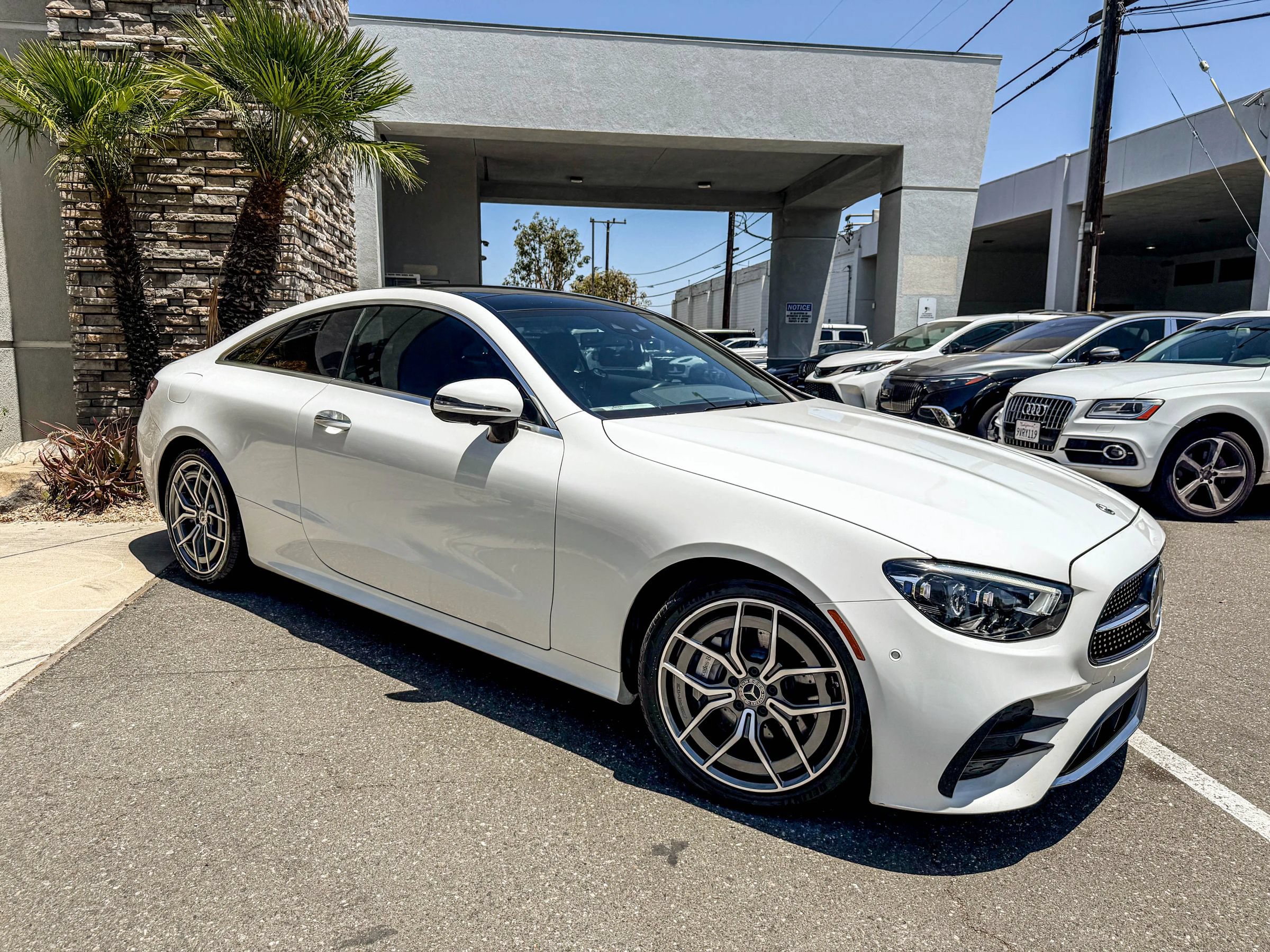 Used 2022 Mercedes-Benz E 450 4MATIC Coupe w/ AMG Line image 1