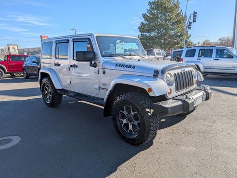 Used 2011 Jeep Wrangler Unlimited 70th Anniversary w/ Dual Top Group image 1