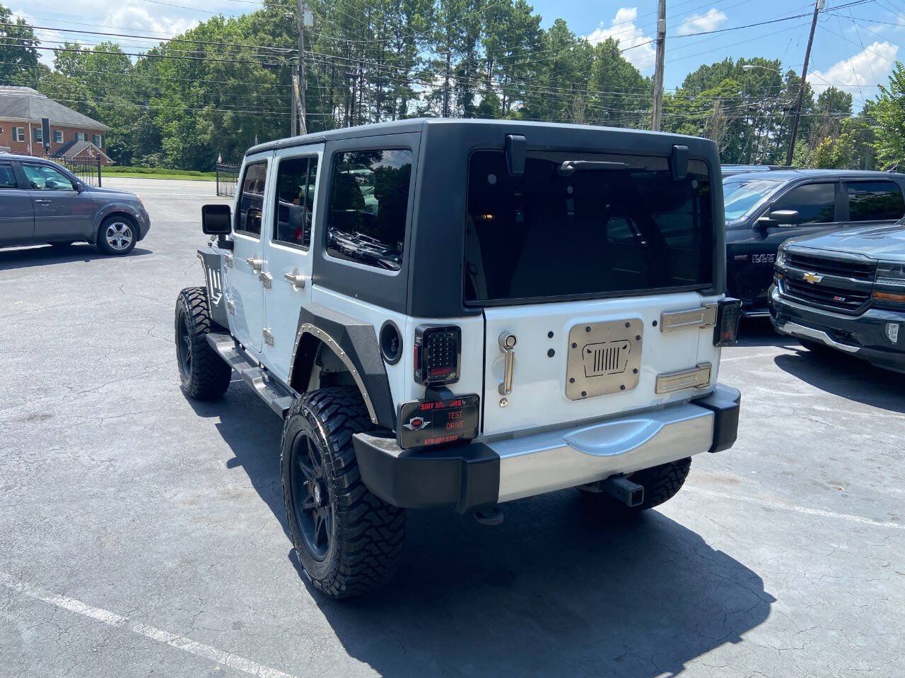 Used 2013 Jeep Wrangler Unlimited Sahara AWD/4WD image 8