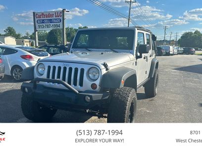 Used 2011 Jeep Wrangler Unlimited Rubicon w/ Dual Top Group