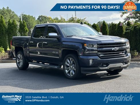 Used 2018 Chevrolet Silverado 1500 LTZ Z71 w/ Centennial Edition AWD/4WD image 1