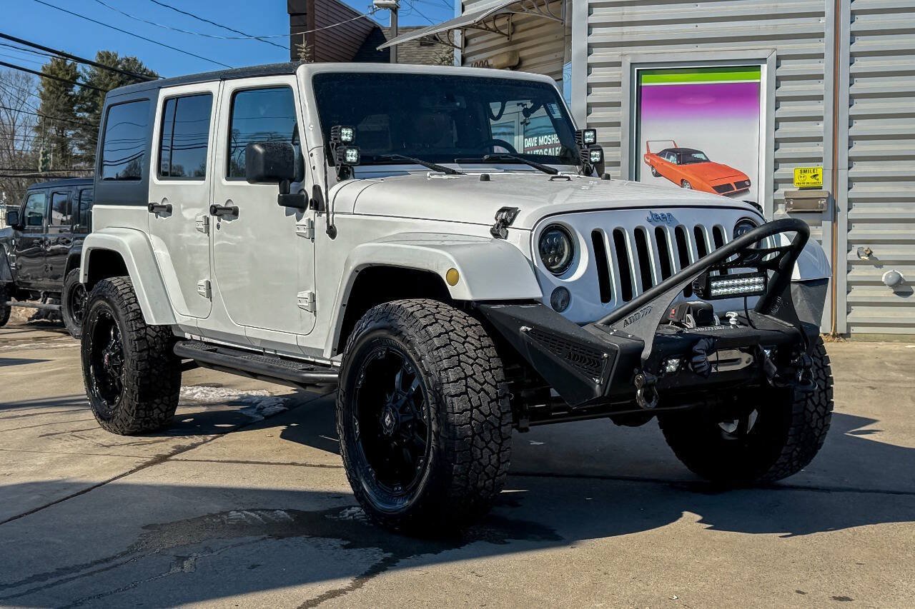 Used 2014 Jeep Wrangler Unlimited Sahara w/ Dual Top Group AWD/4WD image 1